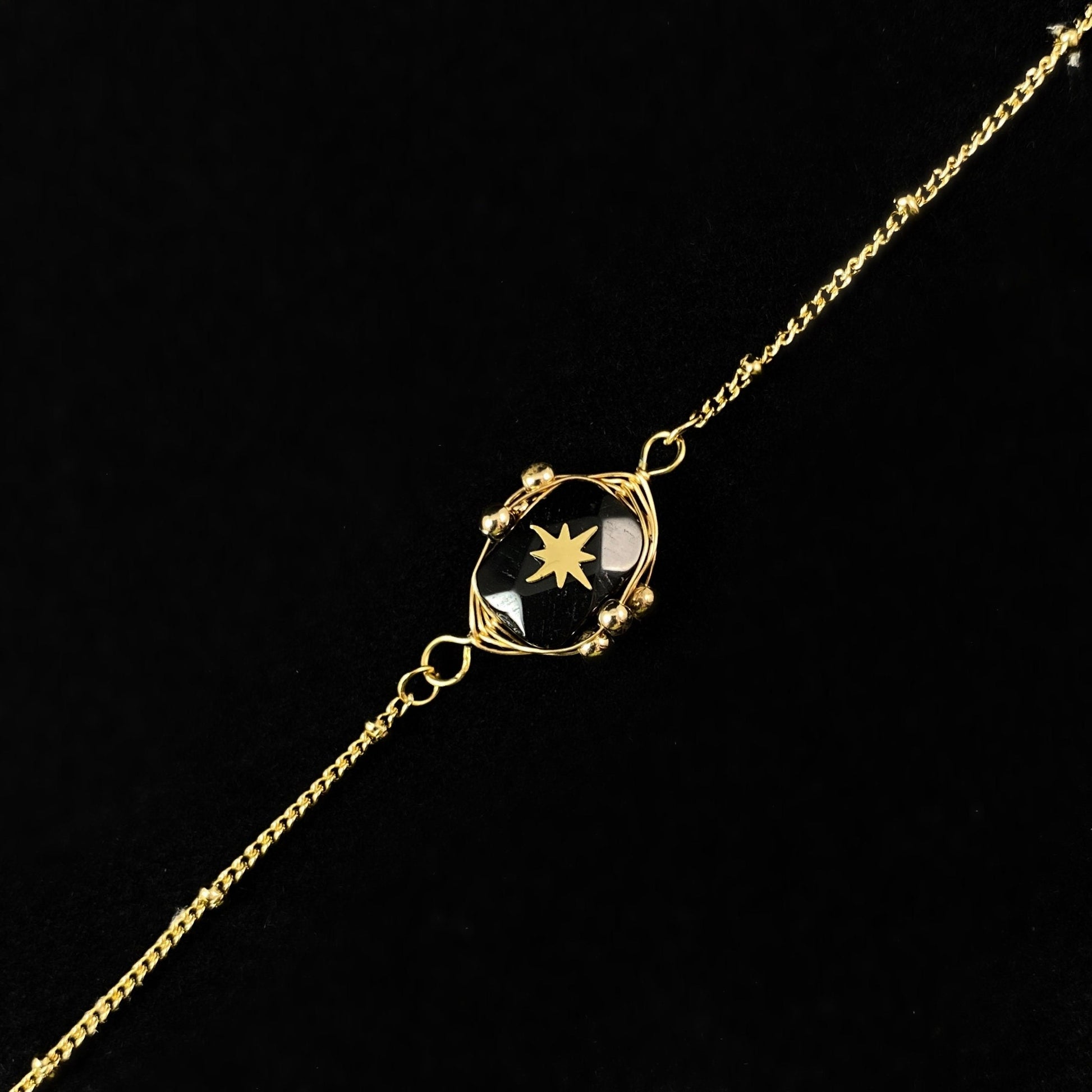 Black Oval Natural Stone Bracelet with Gold Chain Band and Wire Wrapped Setting