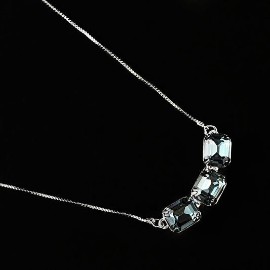 Blue Emerald Cut Crystal Adjustable Silver Triple Tennis