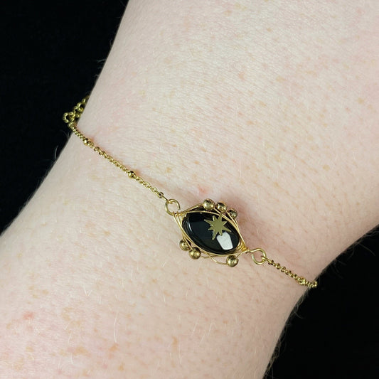 Black Eye-Shaped Natural Stone Bracelet with Gold Chain Band and Wire Wrapped Setting
