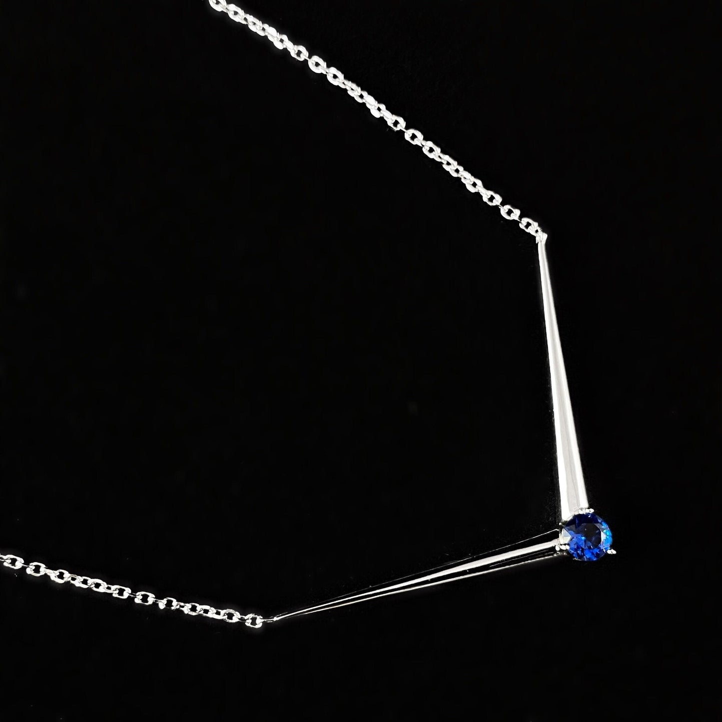 Elegant Dainty Stirling Silver Necklace with V-shaped pendant and Blue Crystal - Genevive