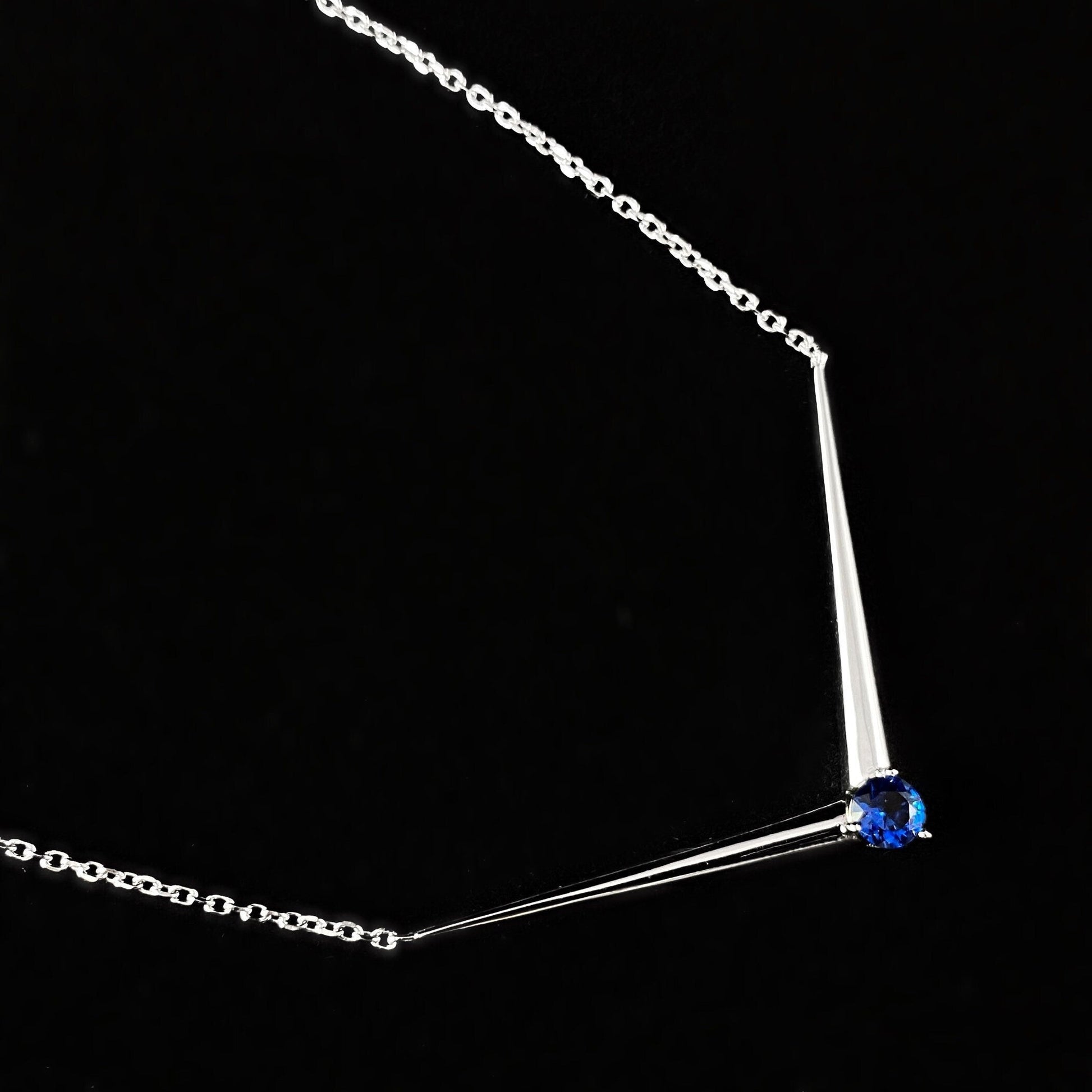 Elegant Dainty Stirling Silver Necklace with V-shaped pendant and Blue Crystal - Genevive