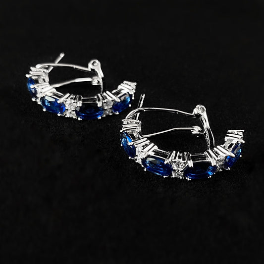 Elegant Silver Half Hoop Earrings with Sapphire Blue Crystals - Genevive