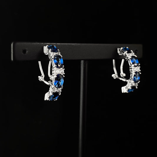 Elegant Silver Half Hoop Earrings with Sapphire Blue Crystals - Genevive