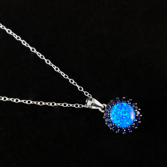 Elegant Silver Necklace with Opalescent Blue Crystal - Genevive