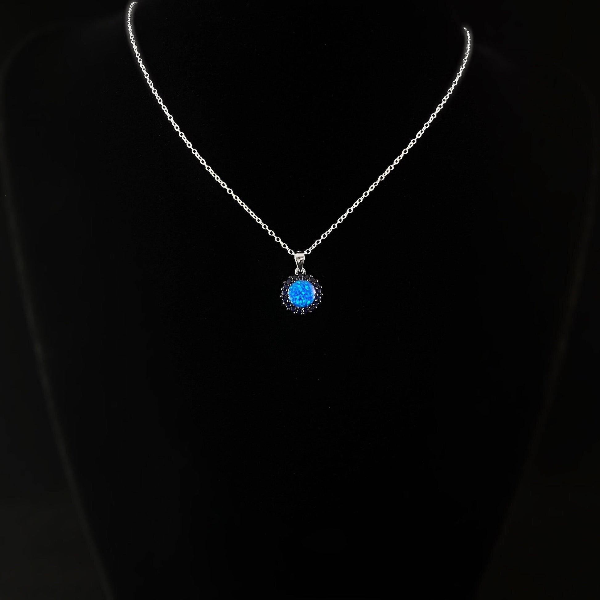 Elegant Silver Necklace with Opalescent Blue Crystal - Genevive