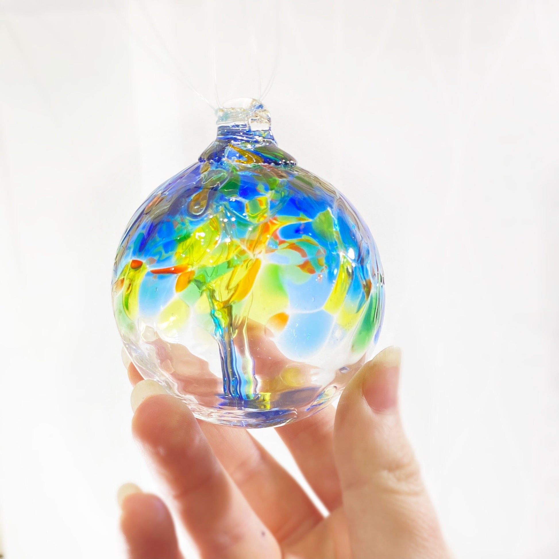 Handmade Glass Art 2” Globe Ornament - Tree of Dreams