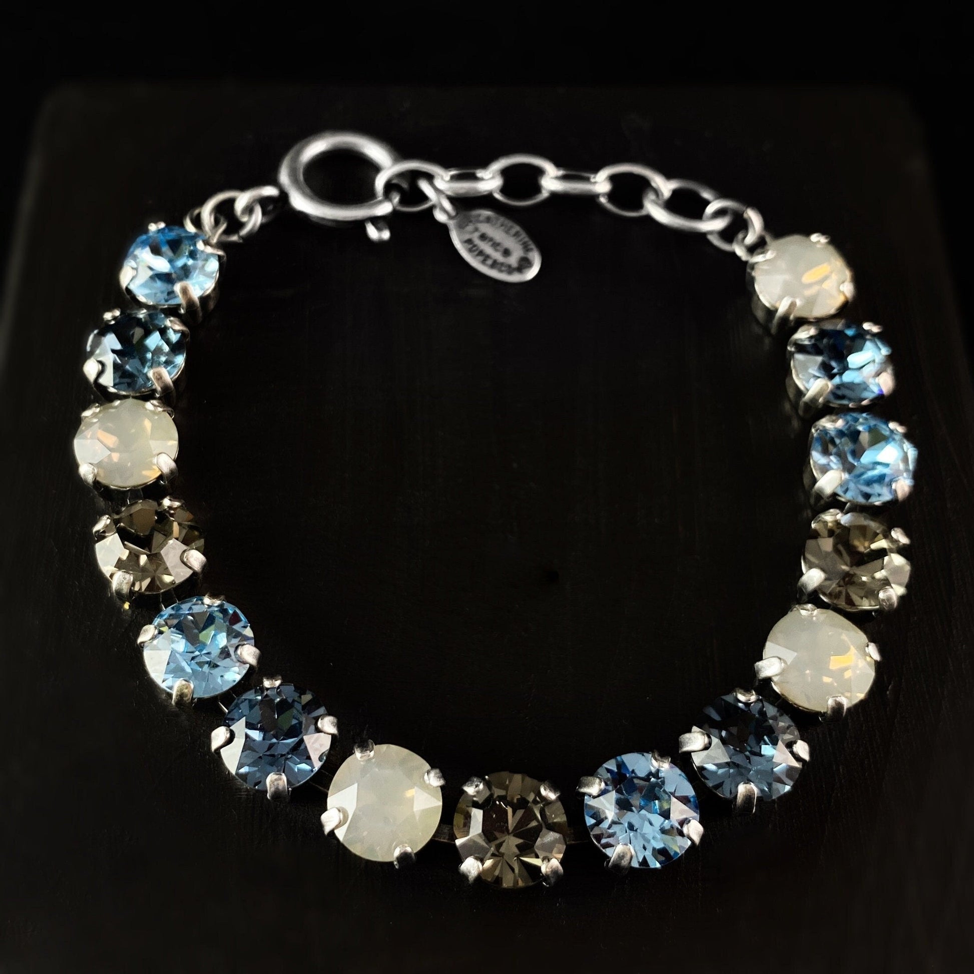 Multicolor Swarovski Crystal Bracelet with Blue, Gray, and Milky Crystals - La Vie Parisienne by Catherine Popesco