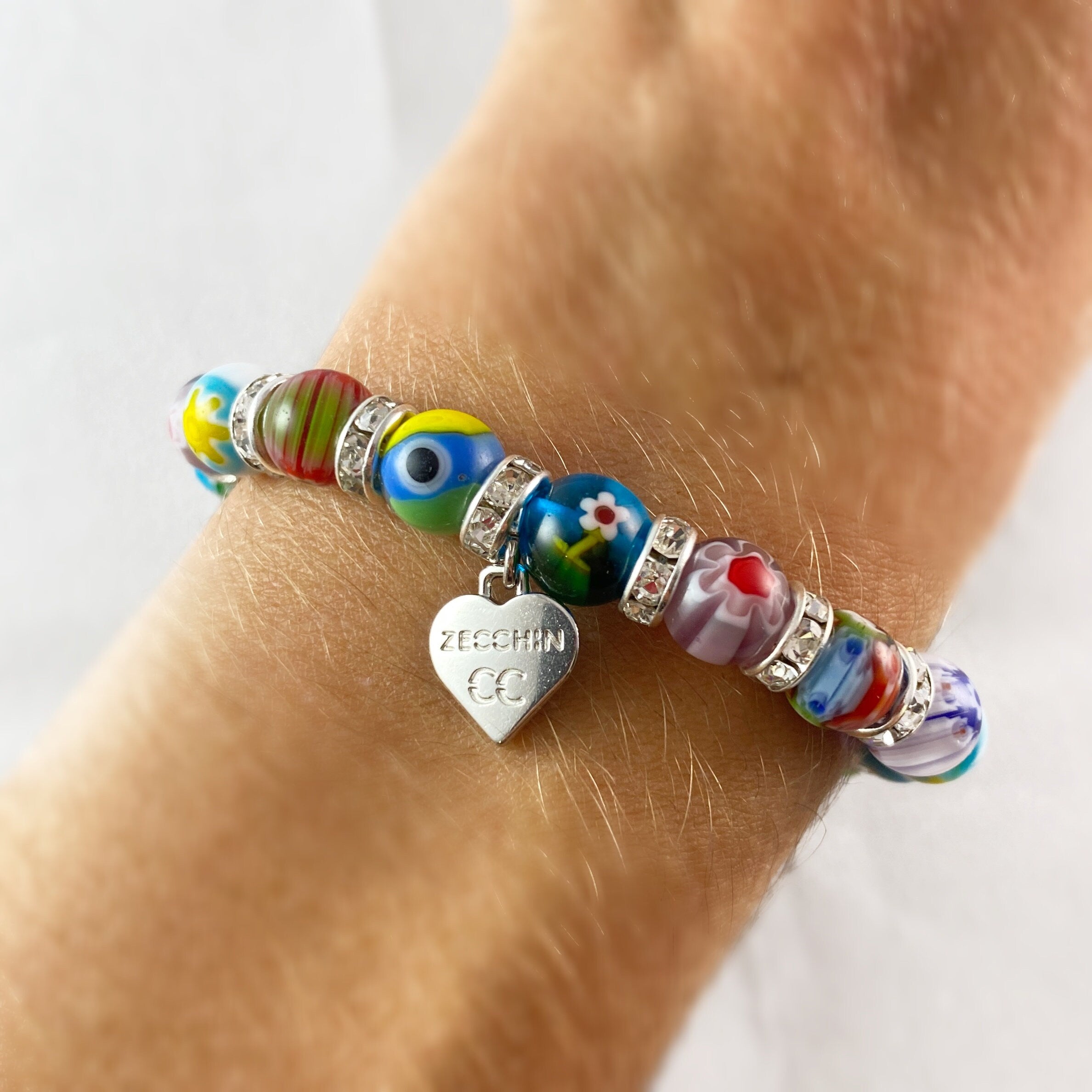 Italian Pink Murano Glass Bead Stretch Bracelet with Sterling Silver Paw  Charm | Ross-Simons