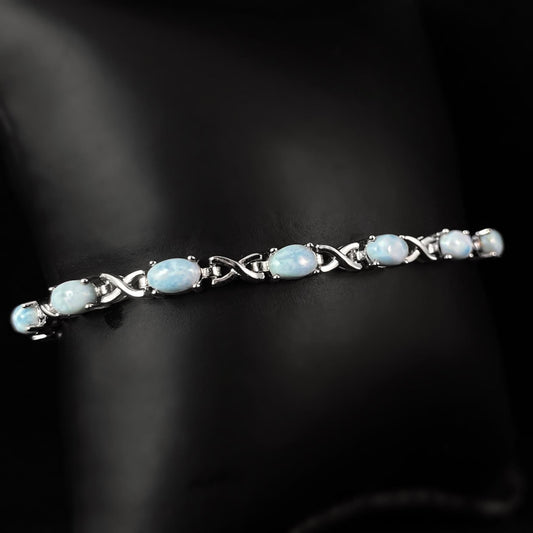 Sterling Silver Infinity Bracelet with Oval Natural Larimar Stones