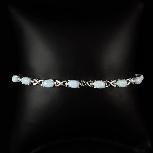 Sterling Silver Infinity Bracelet with Oval Natural Larimar Stones