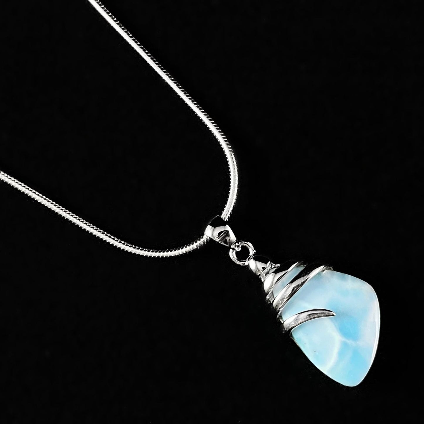 Sterling Silver Twist Necklace with Natural Larimar Stone