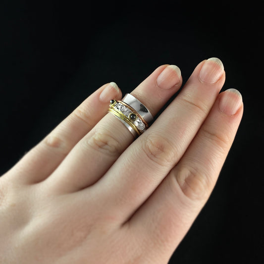 Tri-Color Fidget Ring with Hematite Stones, 14k Gold Plated Spinners, and Hammered Sterling Silver Plated Detailing